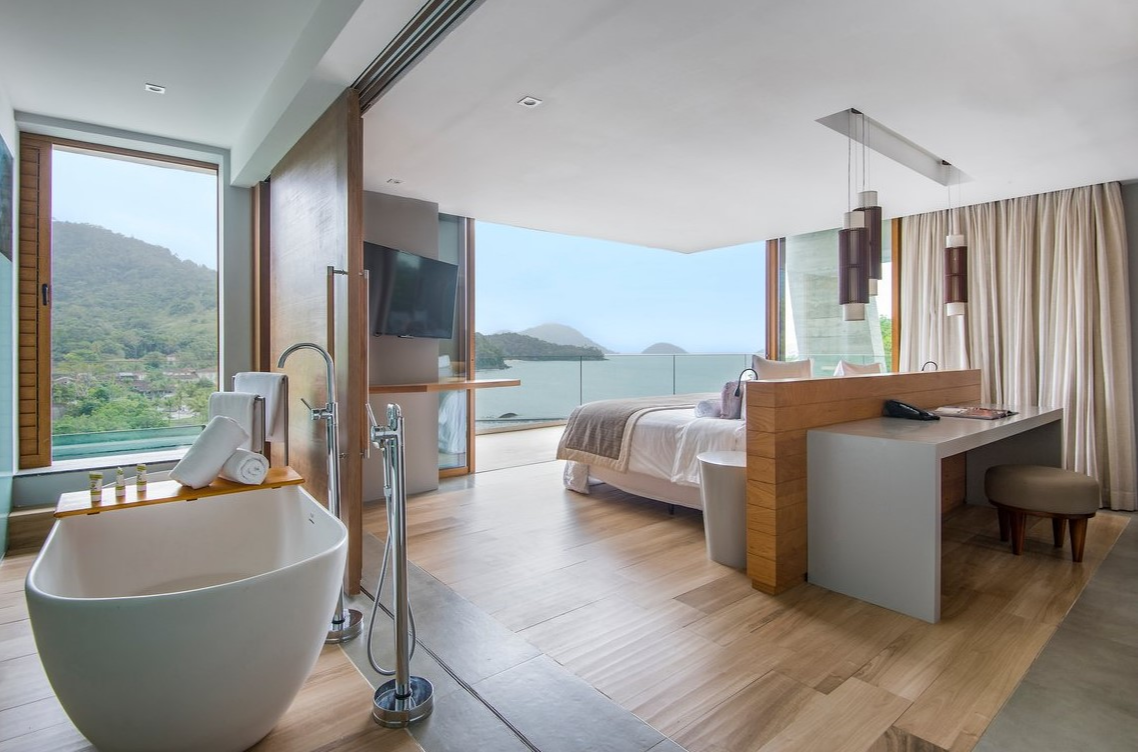 Contemporary room and bath of an exclusive collection suite at Club Med Rio Das Pedras, featuring elegant design. Contemporary room and bath of an exclusive collection suite at Club Med Rio Das Pedras, featuring elegant design.